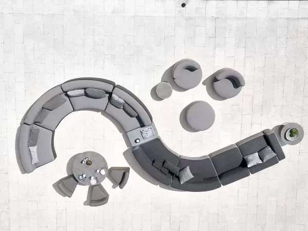 A curved composition of the Modular Sofa by Varaschin
