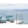 Belt upholstered coffee table by Varaschin in a terrace