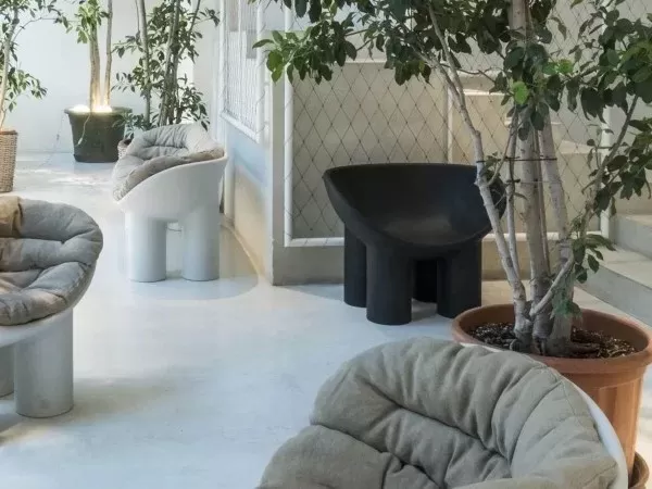 A Roly Poly armchair in a setting