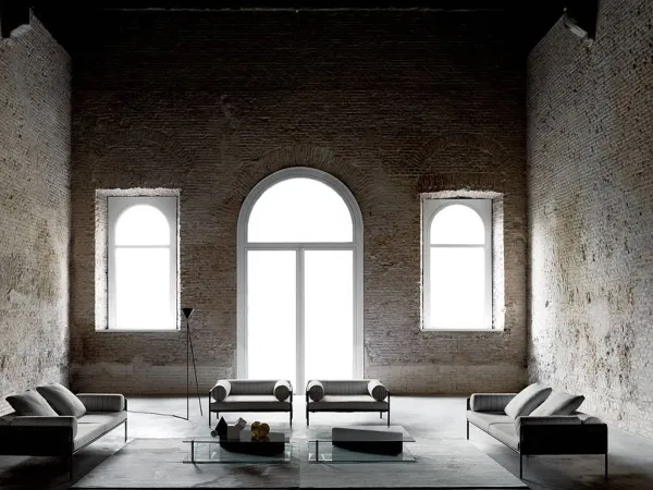 La poltrona Agra e l'omonimo divano firmati Living Divani