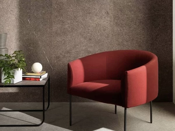 The upholstered Era armchair by Living Divani