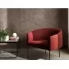 The upholstered Era armchair by Living Divani