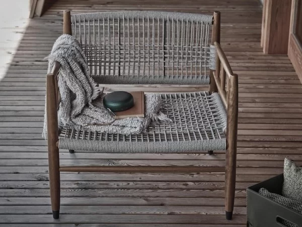 The Lee outdoor armchair in a setting