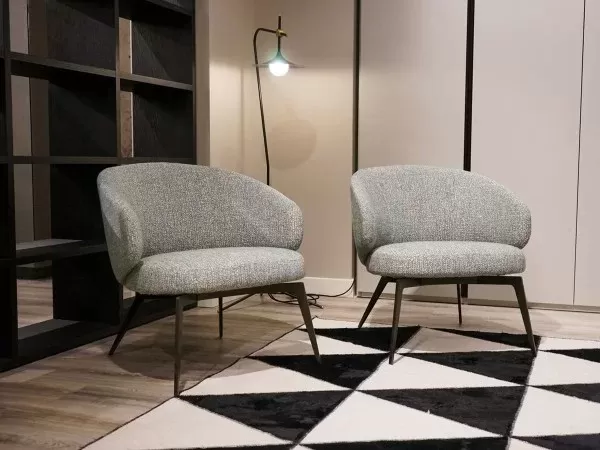 The Bice armchair in a bedroom