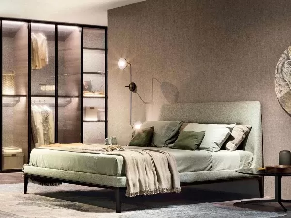 A version of the Victoriano bed in a green finish