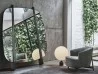 Gong mirror by Porada in a living area