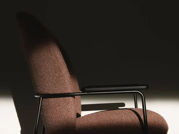 Profile of the Claire armchair by Lema