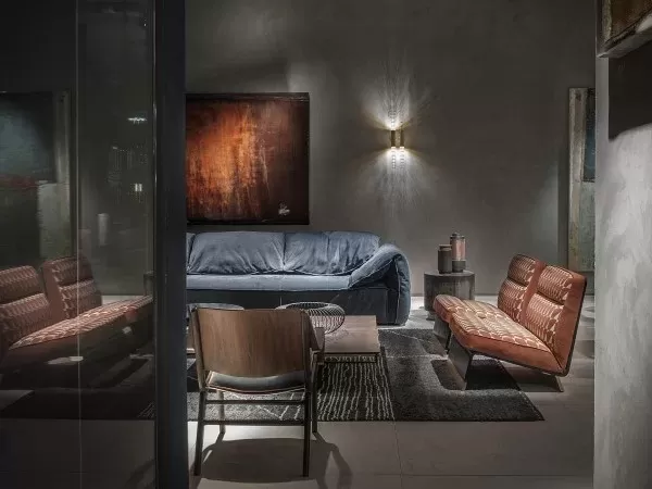 Baxter Greta armchair in a living room