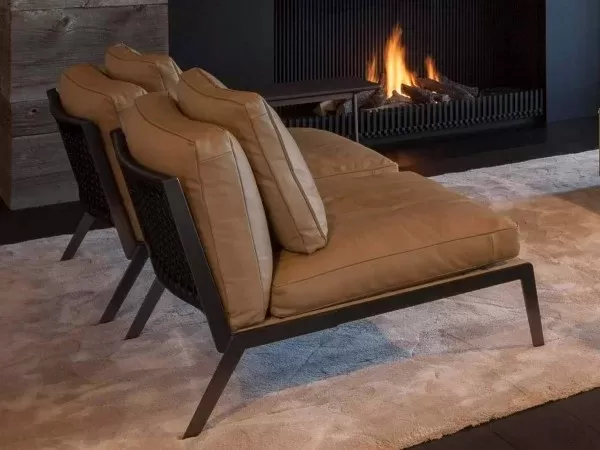 The Happy armchair in a living room