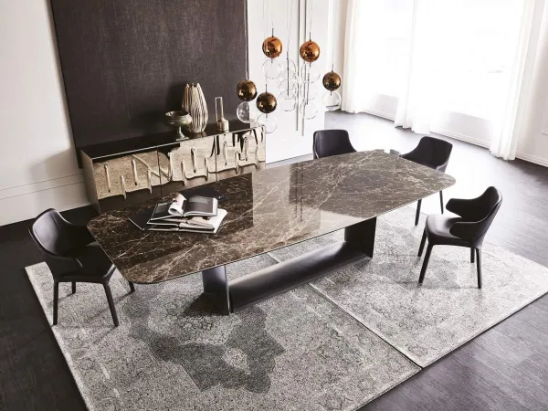 La mesa Dragon Keramik de Cattelan Italia con la encimera de mármol Emperador