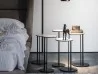 The Sting side table set in a bedroom