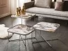 A set of Benny Keramik side tables in a living room