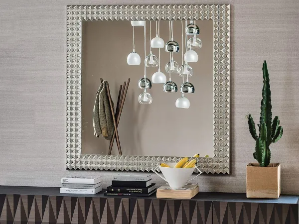 Square version of the Egypt mirror with a warm silver finish