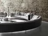 A curved, fluid layout with the Rod Bean sofa by Living Divani