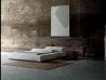 The Extrasoft bed by Living Divani in a room