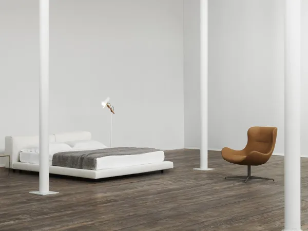 Sillón Oolong de Living Divani en un dormitorio