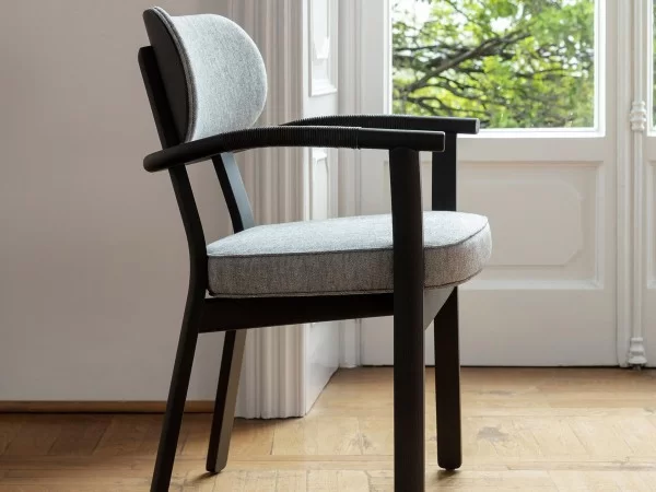 The Evelin chair with details in the armrests