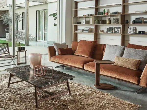 The Giano coffee table by Flexform in a living room area