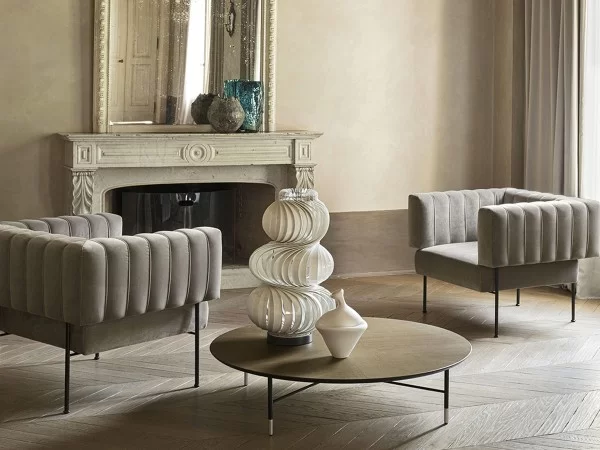 The Fedra armchair by Pianca in a living area
