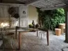 The Autoreggente table by Horm Casamania in an outdoor space