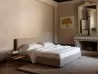 Horm Casamania Bifronte nightstand in a bedroom