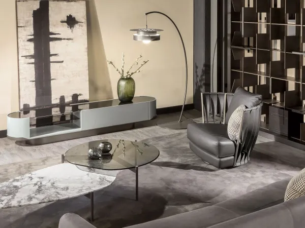 Gregory TV cabinet together with the famous Twist armchair by Cantori