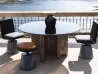 Dharma table by Baxter on a terrace