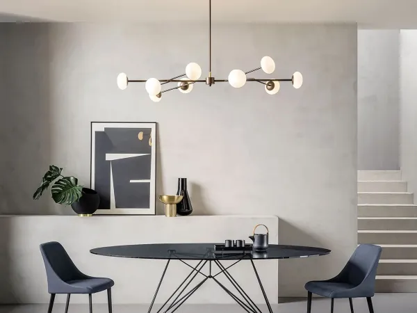 The Ramy lamp by Riflessi in a living area