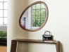 The Giolino mirror by Porada in a living area