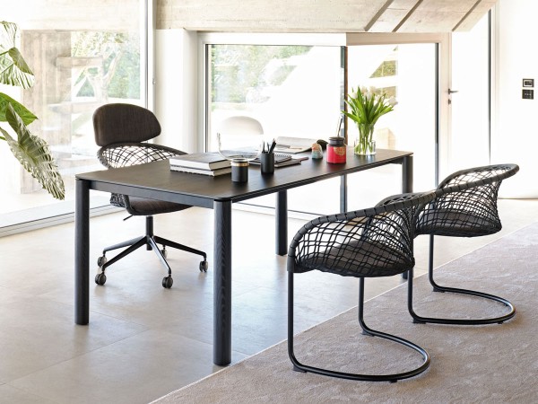 The Woody table by Midj in a study area