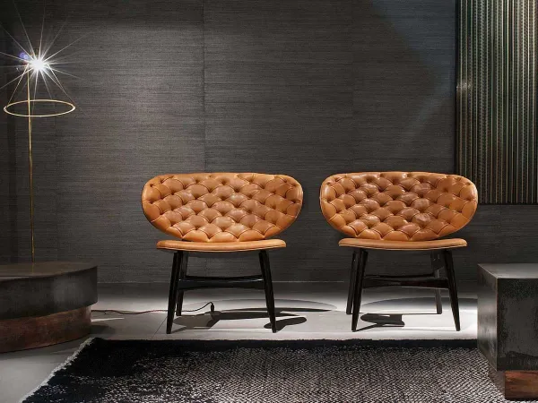 A couple of Dalma armchairs by Baxter