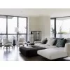 White model Flexform Soft Dream Sofa in living room with table and chairs