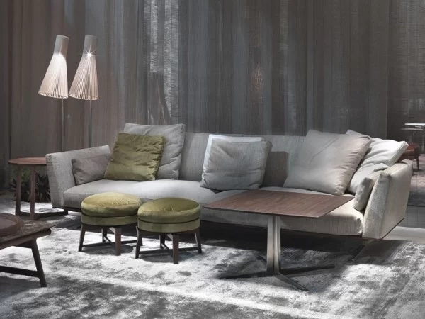 Flexform Evergreen Sofa with coloured cushions, pouf and coffee table.