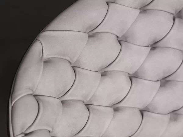 Dalma armchair - Details of the capitonné work on the backrest
