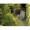 The Nest armchair in an outdoor area